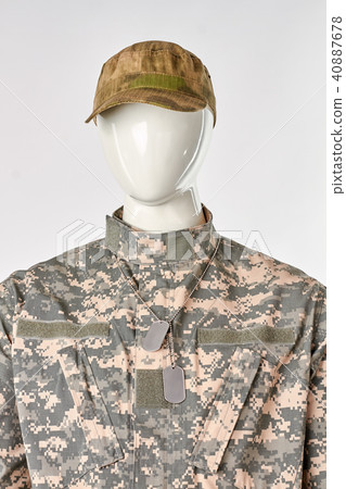 Look of soldier with cap and dog tag, front view. Look of soldier with cap and dog tag, front view. 40887678