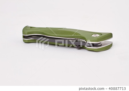 Folded jacknife lying on white. Folded jacknife lying on white. 40887713