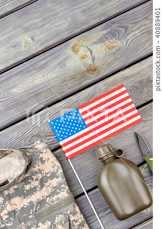 American flag, camouflage clothes, bottle and knife. 40889401