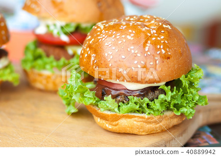Delicious and juicy burger Delicious and juicy burger 40889942