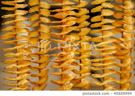 Fried potato on stick Fried potato on stick 40889994