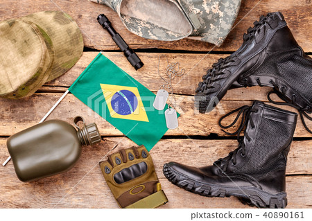 Set of brazil soldier outfit on wooden background. Set of brazil soldier outfit on wooden background. 40890161