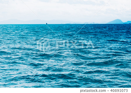 Bright Blue ocean with smooth wave background. 40891073