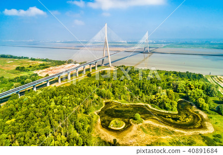 The Pont de Normandie, a road bridge across the Seine linking Le Havre to Honfleur in Normandy The Pont de Normandie, a road bridge across the Seine linking Le Havre to Honfleur in Normandy 40891684