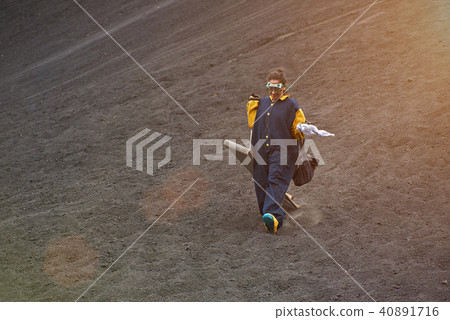 Woman walk with volcano board Woman walk with volcano board 40891716