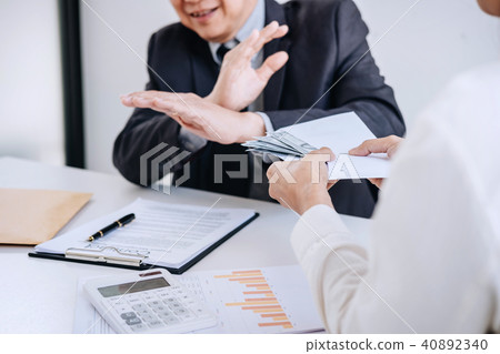 Bribery and corruption concept, senior businessman manager refus 40892340