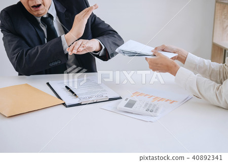 Bribery and corruption concept, senior businessman manager refus 40892341