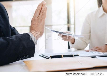 Bribery and corruption concept, senior businessman manager refus 40892342