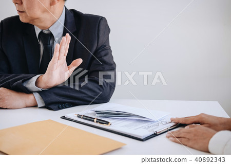 Bribery and corruption concept, senior businessman manager refus Bribery and corruption concept, senior businessman manager refus 40892343