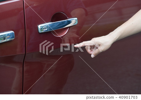 Car dent by door punch 40901703