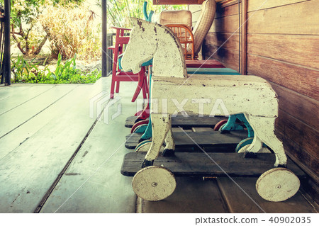 Vintage rocking hourse in old house.  40902035