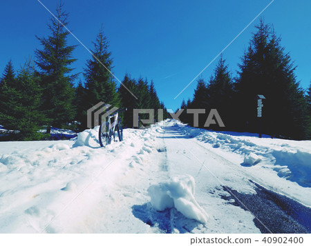 Mountain bike in snow.Cycling on large tire wheels Mountain bike in snow.Cycling on large tire wheels 40902400