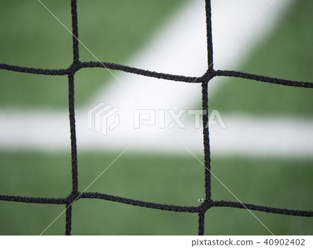 Goal a soccer net with green grass field. Detail Goal a soccer net with green grass field. Detail 40902402