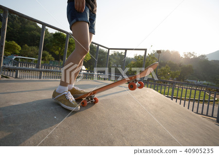 skateboarder skateboarding on skatepark ramp skateboarder skateboarding on skatepark ramp 40905235