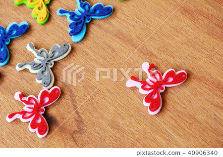 Butterflies made of colorful felt fabrics. Butterflies made of colorful felt fabrics. 40906340