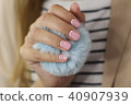 Beautiful female hand with manicure  40907939