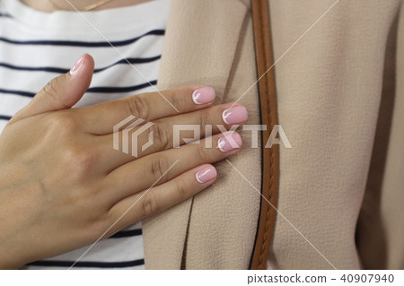 Beautiful female hand with manicure.  40907940