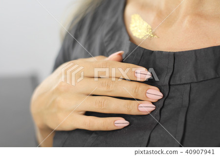 Beautiful female hand with manicure. Beautiful female hand with manicure. 40907941