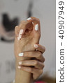 Beautiful female hands with manicure.  40907949
