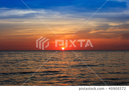 cloudy sunset over the ocean 40908572