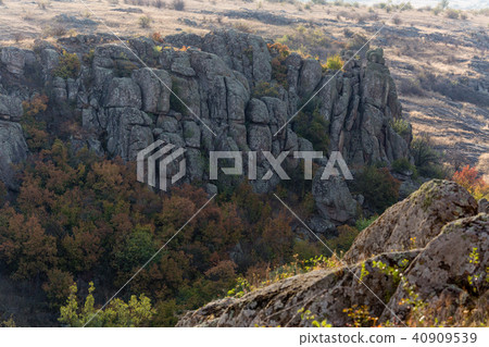 Rock canyon against beautiful sunset background Rock canyon against beautiful sunset background 40909539