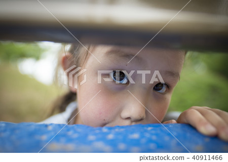A girl peeping at you A girl peeping at you 40911466