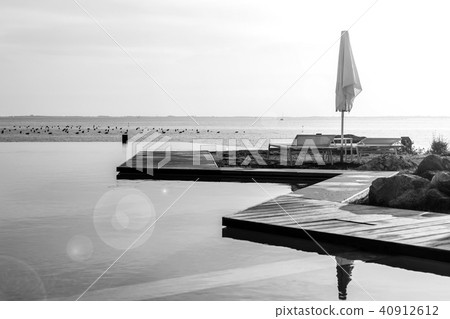 grey beach club pool over the sea grey beach club pool over the sea 40912612