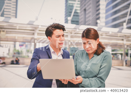 Business Concept. Businessmen are blaming the work of their foll 40913420