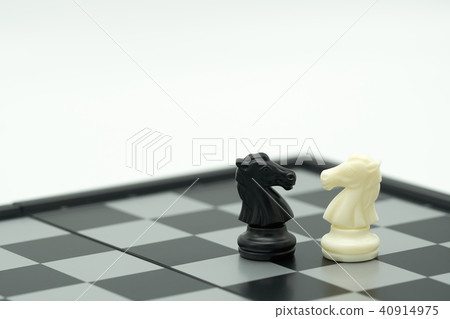 chessboard with a chess piece on the back chessboard with a chess piece on the back 40914975