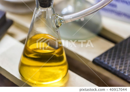 Flask with white wine in industrial laboratory 40917044