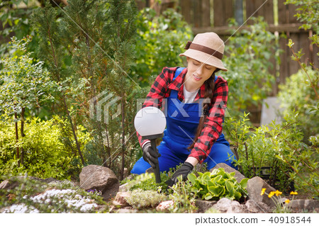 landscape designer holding decorative lamp landscape designer holding decorative lamp 40918544