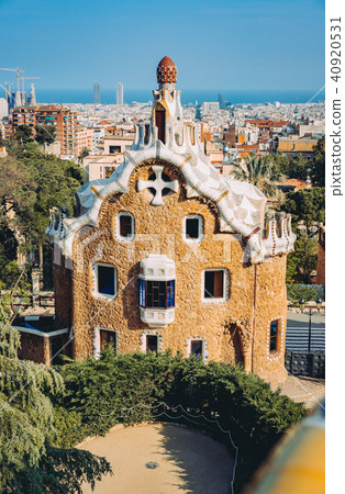 A colorful mosaic building in Park Guell in evening warm Sun light, Barcelona City, Spain 40920531