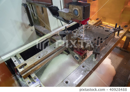 The CNC wire-EDM machine 40928488