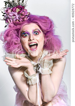 Beautiful girl with purple hair. Bright makeup 40928772