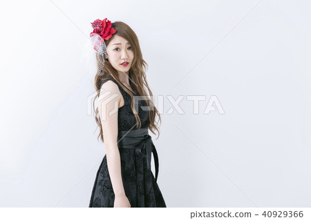 A woman in a black dress A woman in a black dress 40929366