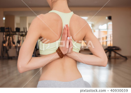 Young woman practicing yoga  40930039