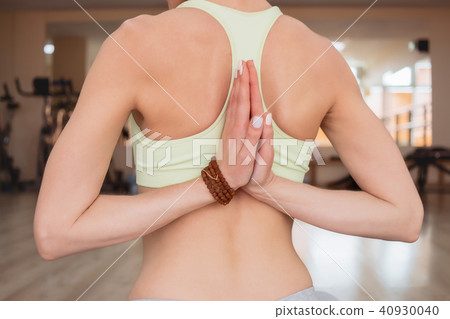 Young woman practicing yoga Young woman practicing yoga 40930040