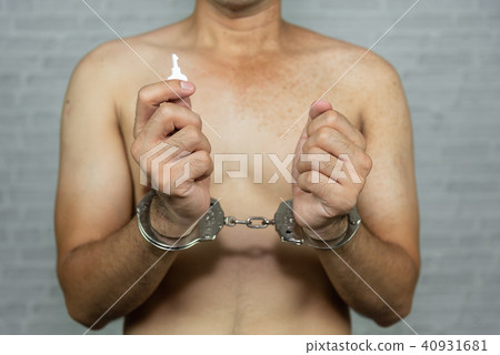portrait of a man prisoner with handcuff portrait of a man prisoner with handcuff 40931681