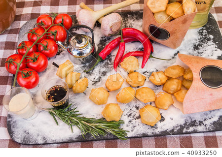 Cooking. Potatoes, flour, rosemary. Cooking. Potatoes, flour, rosemary. 40933250