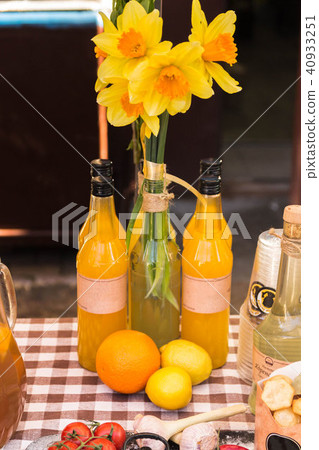 Flowers are in the bottle. 40933251