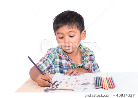 Cute little boy painting on book drawing 40934327
