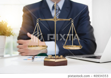 Justice symbol weigh scales on table 40934353