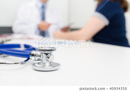Patient and doctor at the office Patient and doctor at the office 40934358