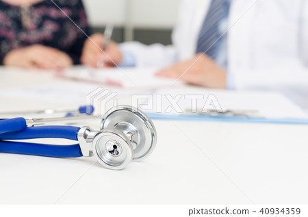 Patient and doctor at the office Patient and doctor at the office 40934359