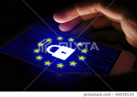 GDPR Concept with man using smartphone and lock 40936530