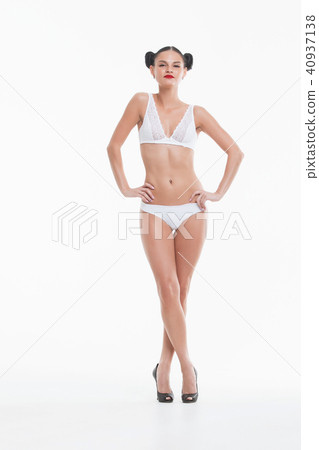 Perfect body young woman on a white background - Stock Photo