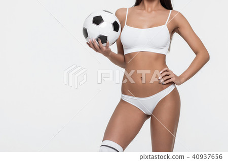 Crop woman in underwear holding soccer ball Crop woman in underwear holding soccer ball 40937656