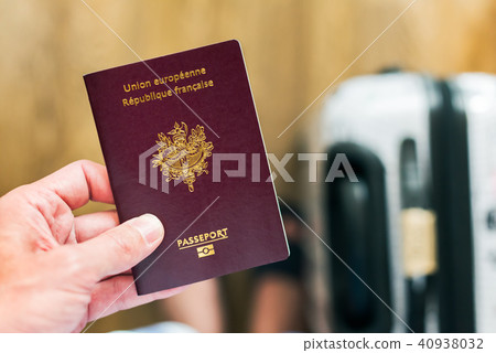 Hand holding a french - european passport Hand holding a french - european passport 40938032