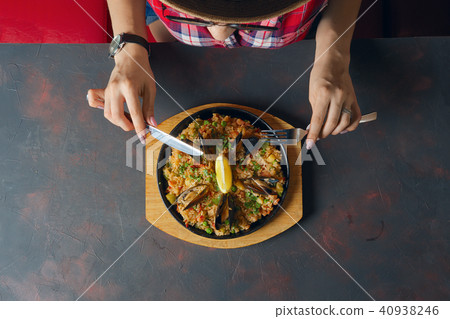 Top view of tourist having spanish meal in cafe Top view of tourist having spanish meal in cafe 40938246