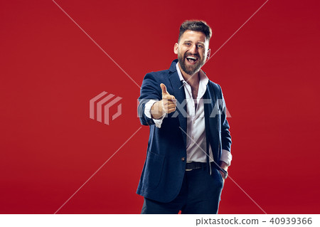 The happy business man point you and want you, half length closeup portrait on red background. The happy business man point you and want you, half length closeup portrait on red background. 40939366
